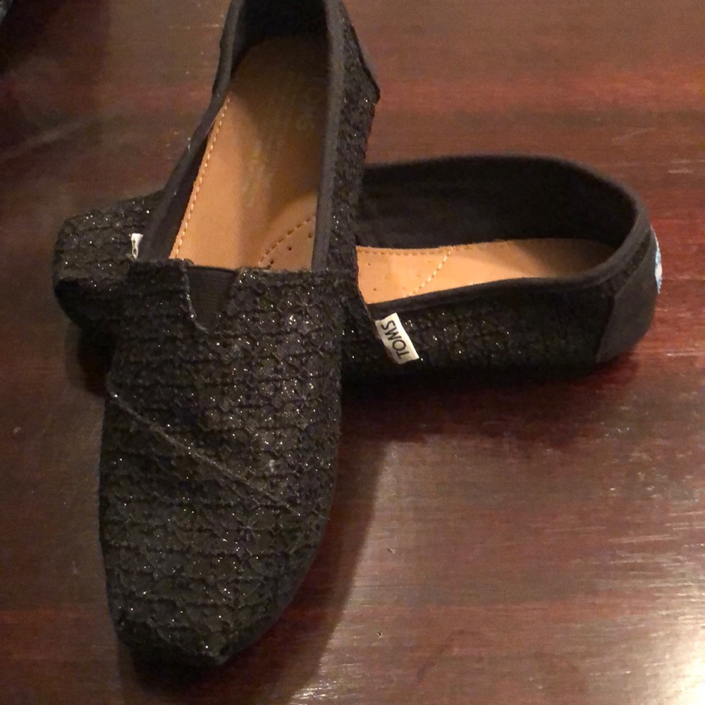Black glitter TOMS canvas shoes